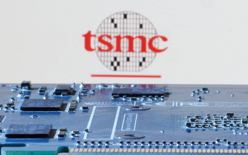 © Reuters. FILE PHOTO: Taiwan Semiconductor Manufacturing Company (TSMC) logo is seen near computer motherboard in this illustration taken January 8, 2024. REUTERS/Dado Ruvic/Illustration/ File Photo