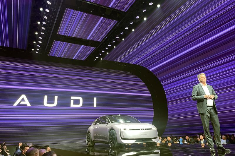 © Reuters. An E Concept electric vehicle (EV) of AUDI, a new EV brand Audi co-developed with Chinese automaker SAIC, is displayed onstage during a launch event in Shanghai, China November 7, 2024. REUTERS/Brenda Goh